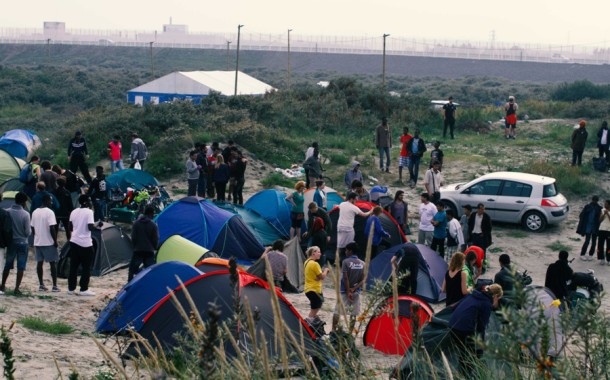 بالصور: فرنسا تخلي جزء من مخيم كاليه العشوائي